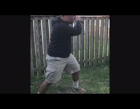 Red Bat Guy Hits Ipad in Grass Field