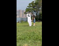 Collab winy - Giant sock with letter B hang on clothesline