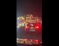 Girl dressed as angel sits through sunroof 