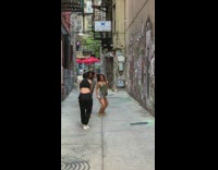 Guy girl dance choreography alley red umbrella 