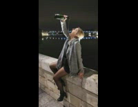 Woman pour wine mouth FAIL bridge barrier