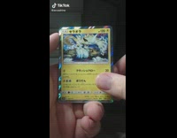 Guy opening pokemon cards reaction 