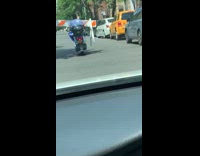 Collab winy - Guy blue vespa scooter orange traffic barrier 