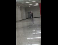 a couple ballroom dances on subway platform