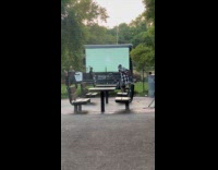 Collab WINY - Man checkered top dance to music park