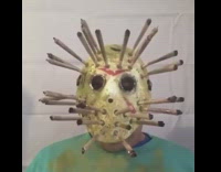 Green shirt guy jason costume mask smokes 