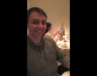 Woman take selfie man drink wine restaurant