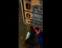 Guy raps presses pedestrian crossing button wait 
