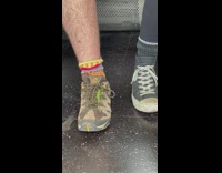 Guy pulls up sock for crawling bug 