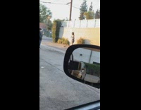 Girl white top complain to cameraman mirror