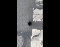 Deep hole on street ground pavement
