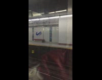 Collab Subway Creatures - Blue nike logo painted on wall 