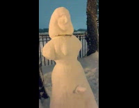 Lady wearing dress snowman at park 