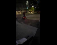 Girl falls off red scooter