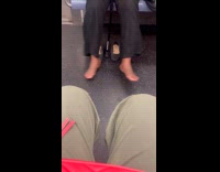 Woman takes off shoes inside the train