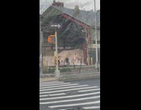 Guy Places Guitar on Sand Pile 