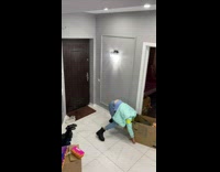 Womans head falls into box while tying shoe 