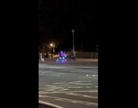 Person drive electric bike with changing lights