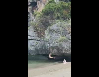 Guy does pull up on giant rock