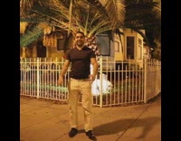 Guy and husky wear matching Egyptian costumes 