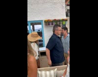 People Cheer in Surprise as Artist Couple Leave