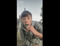 Guy bites into fruit jelly 