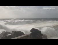 Man sit sea strong wind big wave