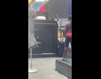 Man red brief twerk shake butt Times Square 