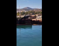 Woman wears floatie photoshoots in old ship