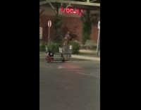 Man Vlogger shout parking lot grocery store