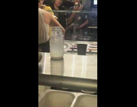 Doll takes photo with ice cream