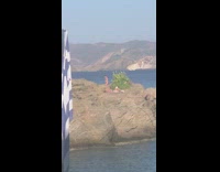 Woman bikini tiktok dance beach rock plants