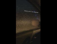 Guy rolls car window down punches ice 