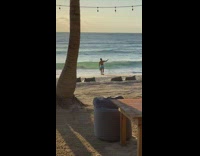 Guy takes selfie at beach