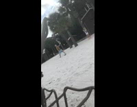 Man sling shot orange ball picture