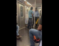 Guy and older man argue in train 