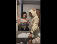 Flip switch grey pink shirt yellow sweater 