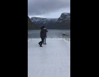 Elaborate panorama photo black beanie boat guy