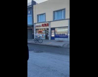 Lady Passes by Car with Blossom Print 