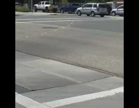 Two woman photo shoot middle road caught filmer