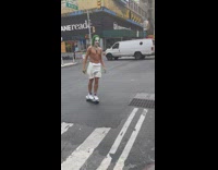 Joker skateboards on street 