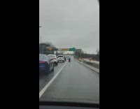 Old man drive mobility scooter on highway