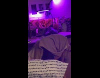 Cat beside fish tank stare at woman