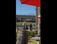 Guys hold finger up selfie photo sidewalk