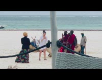Woman selfie Kenyan People red outfit beach
