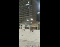 Women film skating video together 