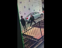 Guy standing on wooden plank security footage