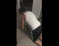 Boy uses ab roller and hits his tooth against the floor