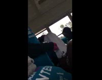 Boy freestyle raps and sings about needing to go pee on the bus