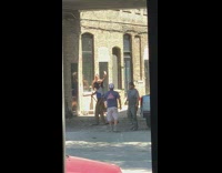 Two girls raise bend legs construction worker